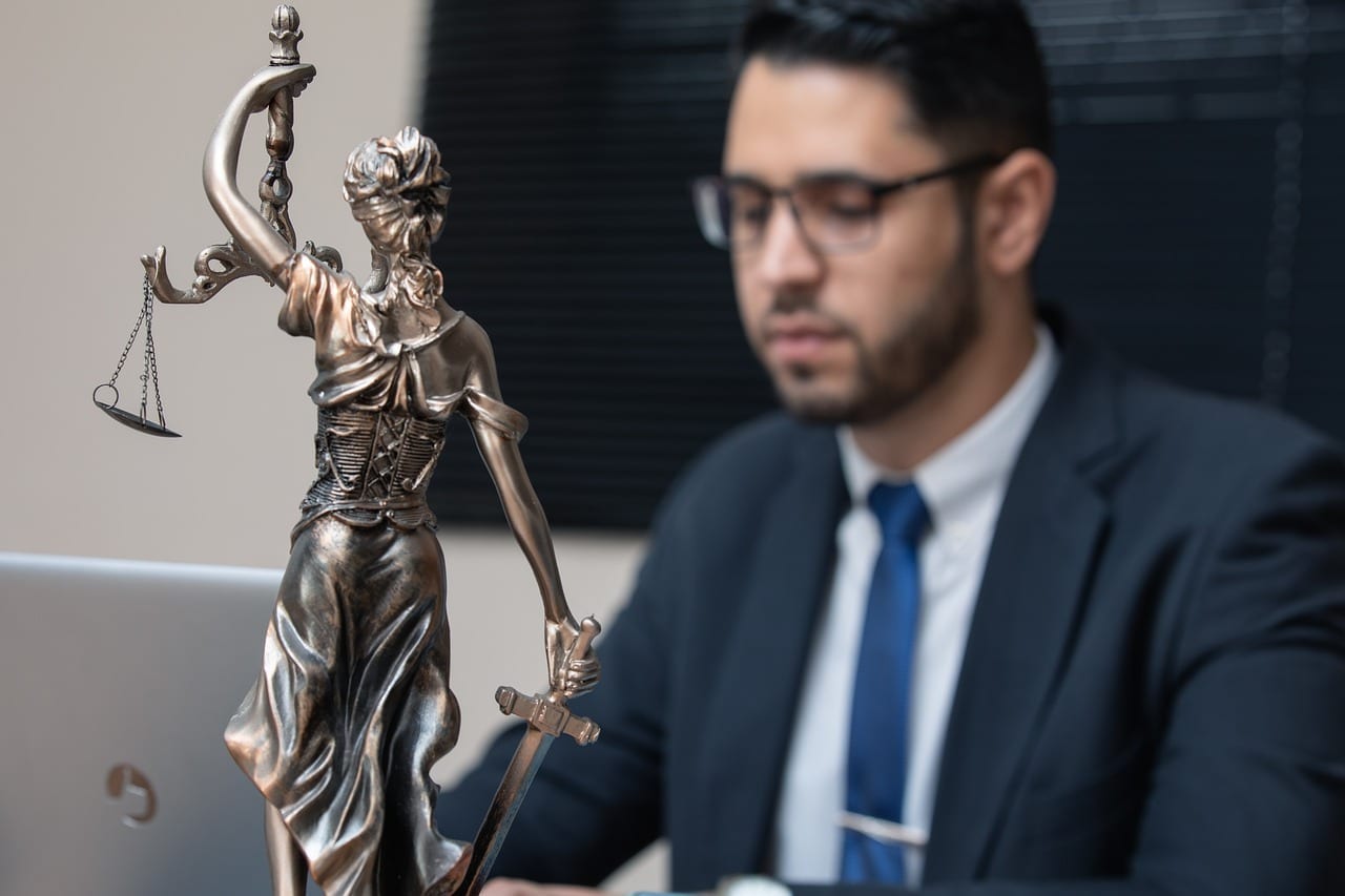 Lawyer typing on a laptop