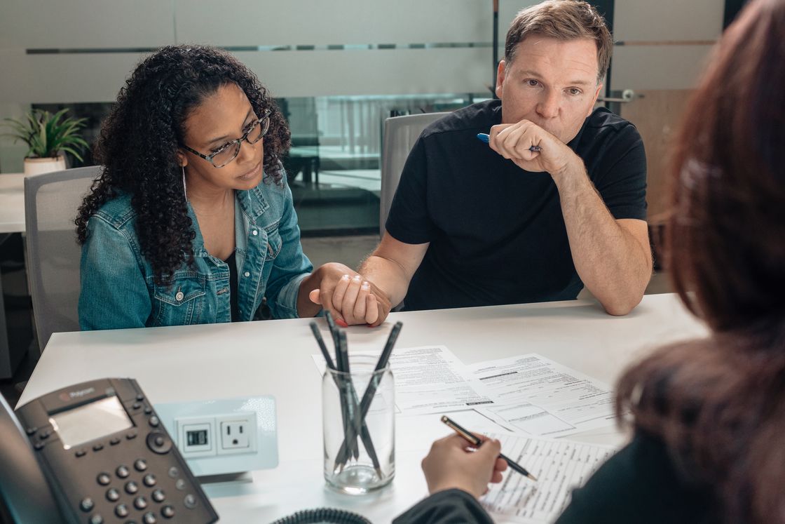 Couple in a meeting with their lawyer