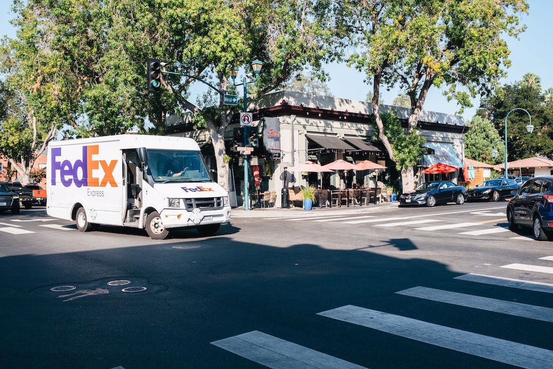 FedEx truck about to cross an intersection