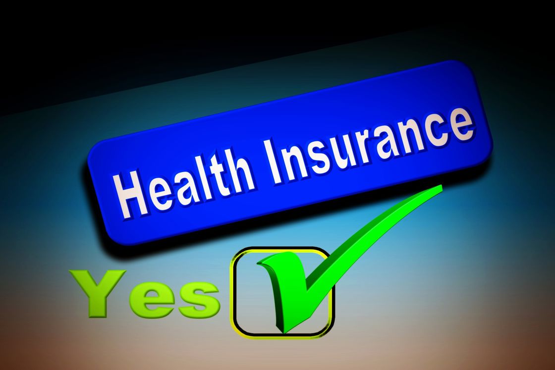 Graphic image of the word health insurance with a yes and check mark