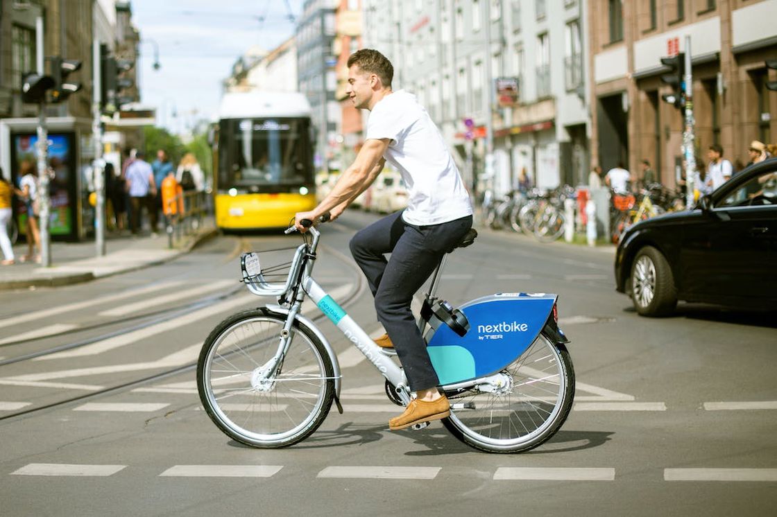 Man riding his bicycle on an intersection