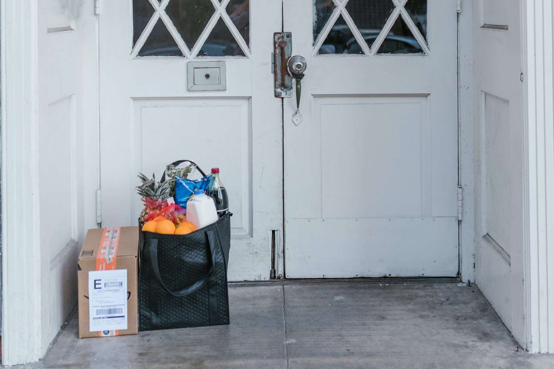 Groceries and packages left at a doorstep