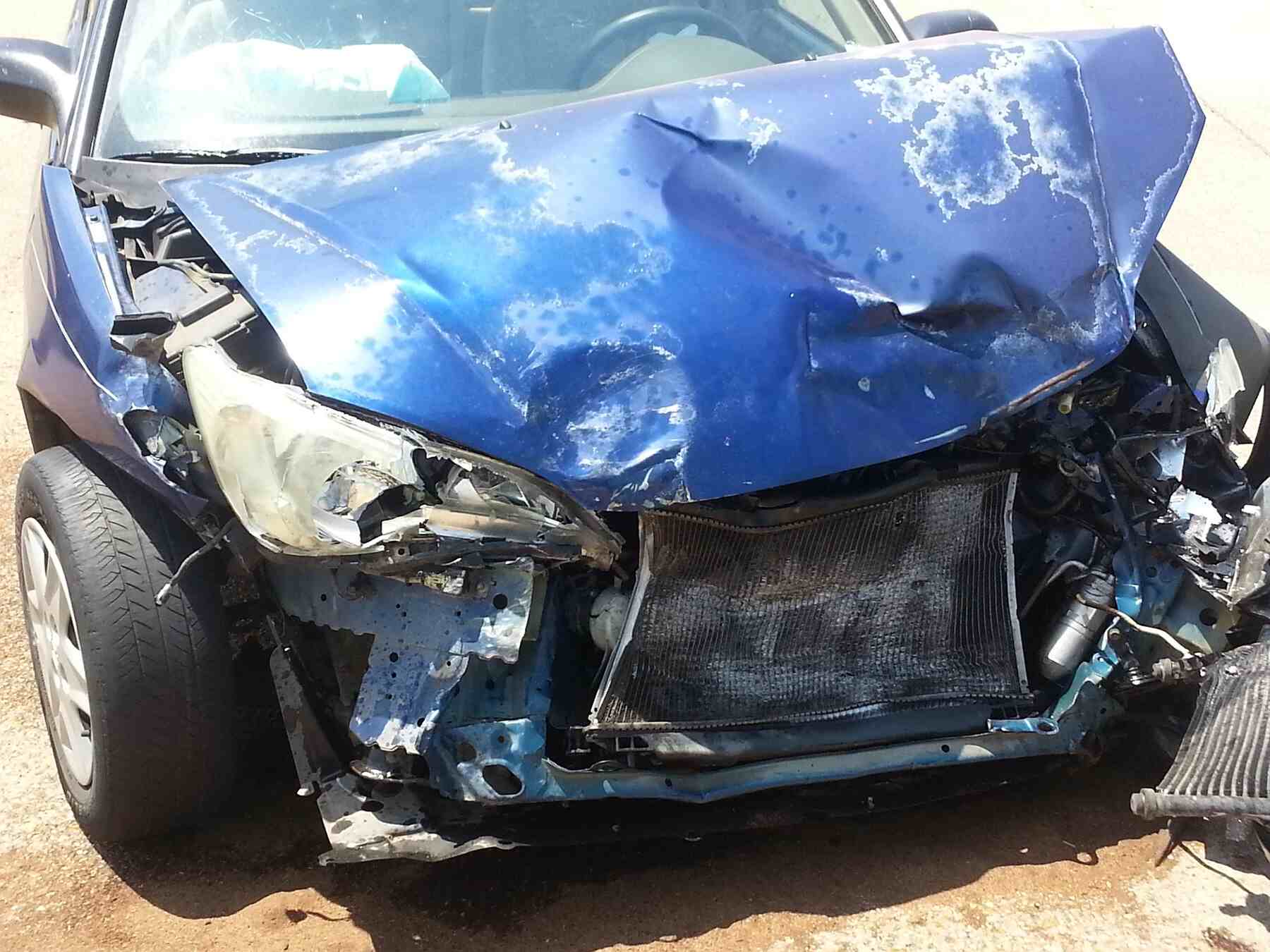 Car with an extremely damaged front bumper