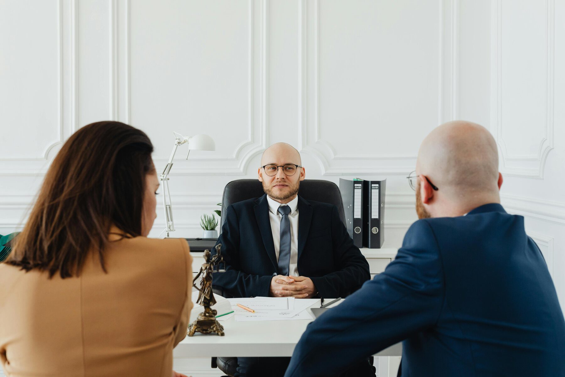 Lawyer listening to a couple during a meeting