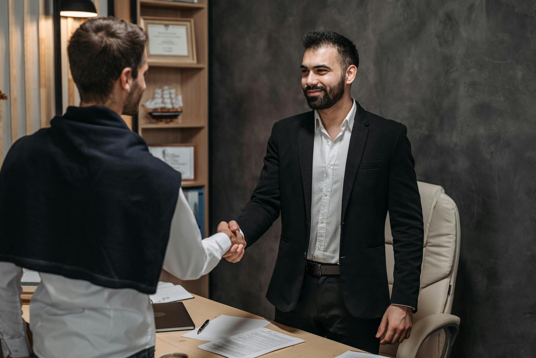 Lawyer shaking hands with a client