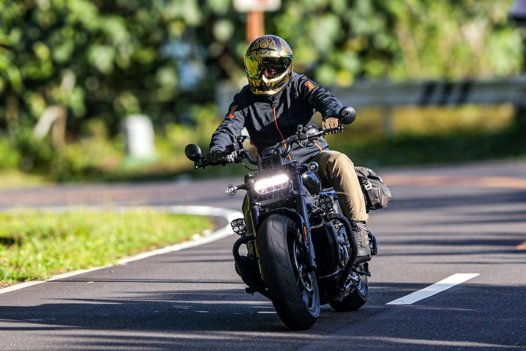 Man wearing helmet while riding a motorcycle