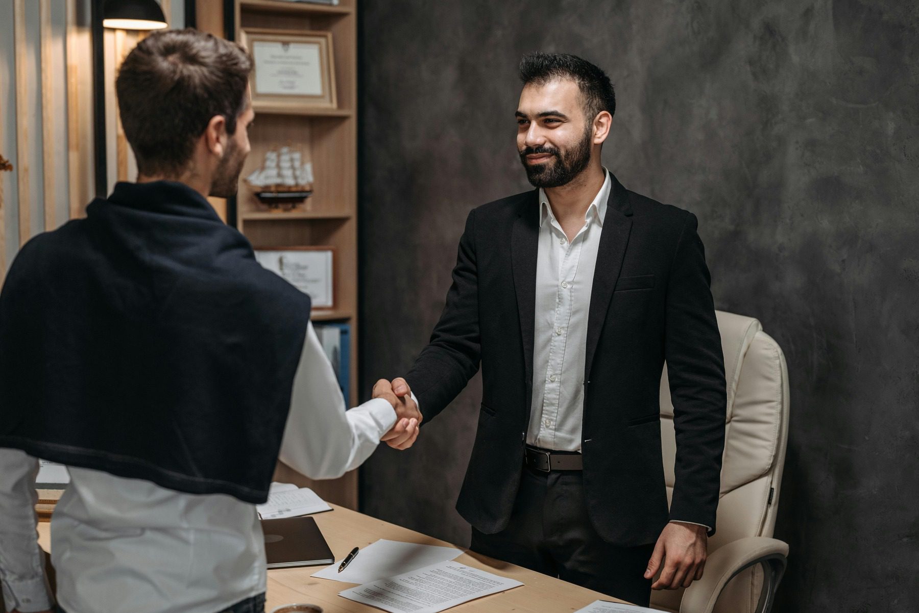 Two men shaking hands in agreement