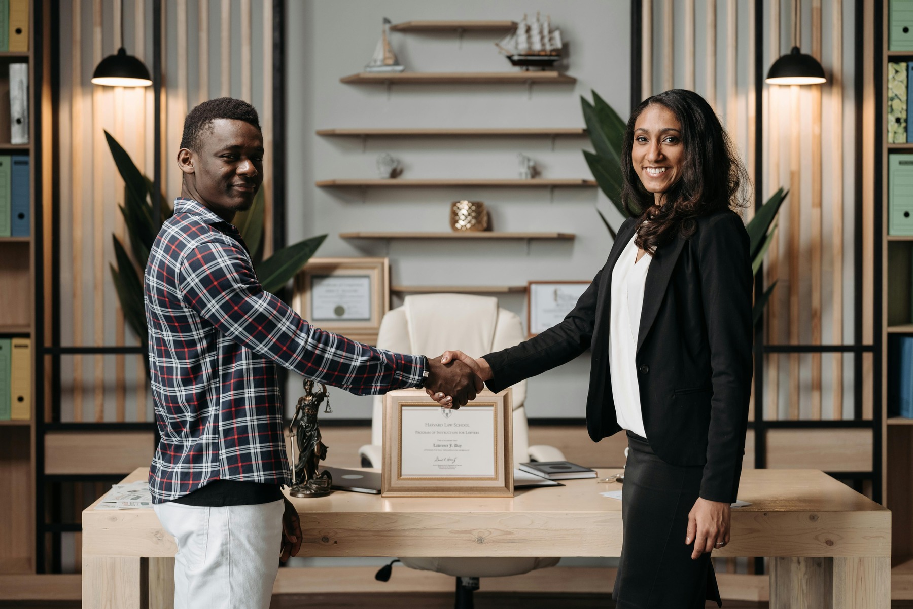 A man shaking hands with an attorney
